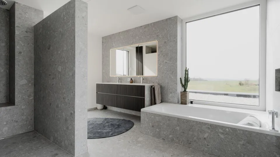 Badezimmer mit Badewanne am Fenster, Spiegel und Waschtisch